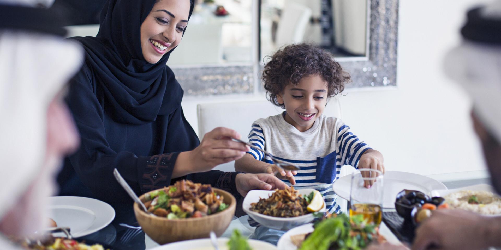 parent and child eating together